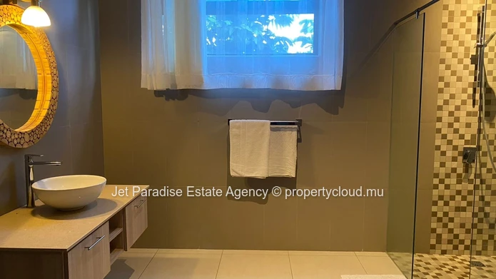Luxury 3-Bedroom Balinese-Style Apartment in Secure Residence, 5 Minutes from the Beach