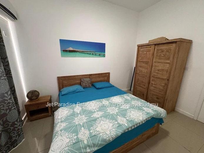 "Stunning Sea View Furnished Apartment in Flic en Flac with Pool Access - Ideal for Beachfront Living! 